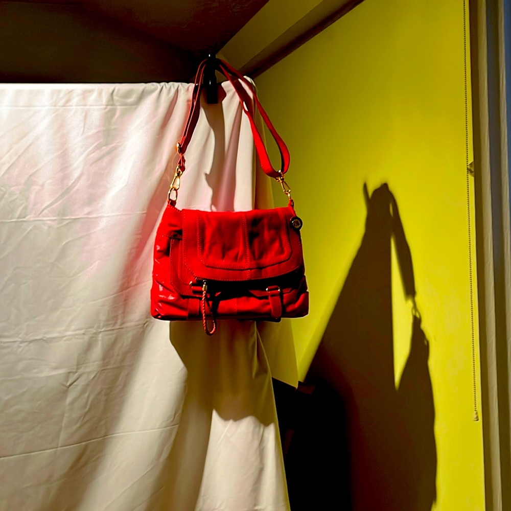 Leather handbag used. Few light scratches on back. Plenty of room